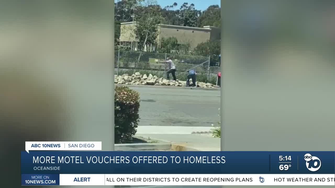 Men seen trying to remove rocks meant to deter homeless