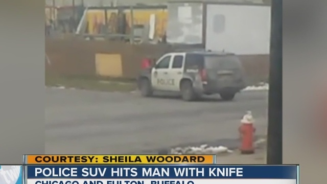 Buffalo police SUV hits man with knife