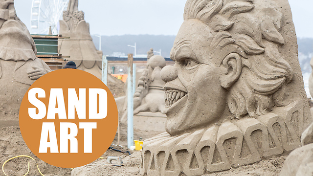 Sand artists create stunning sculptures for circus themed festival