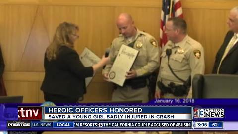 Police officers honored for helping girls