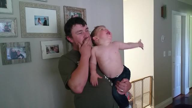 Father And A Son Blow Kisses To Mom With A Funny Twist