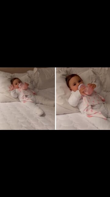 Adorable baby gets ready for bedtime