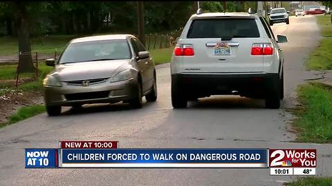 Kids forced to walk on dangerous road