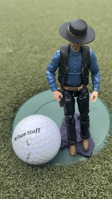Golf is different for a tiny cowboy