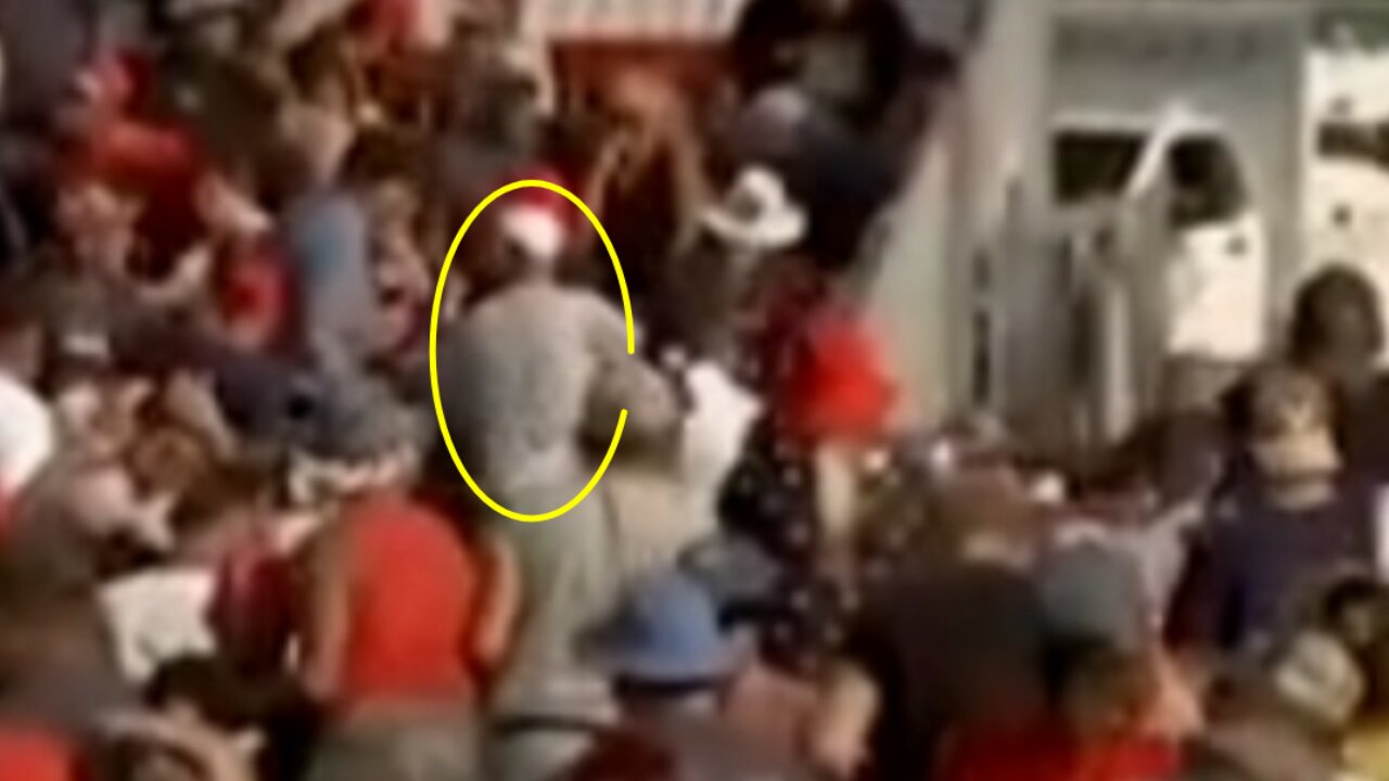 Trump Psyop. The Wrangler, directing the crowd.