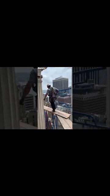 SKYSCRAPER MEN-AT-WORK