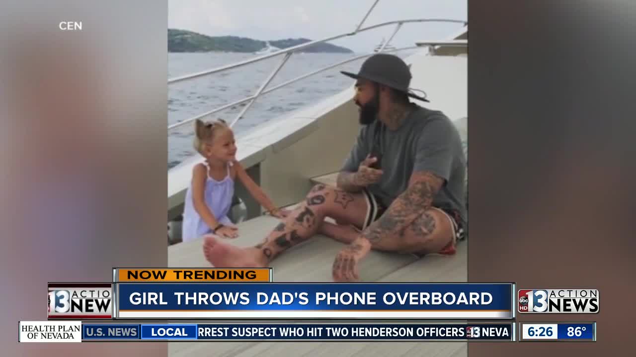 Girl throws dad's phone overboard