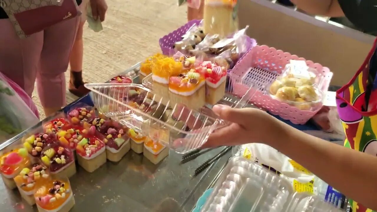 Cenon selling food at the market! (she was shut down by the food police when she did this in the US)