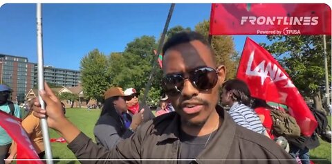 Brave Young Man Alone Among Protesters