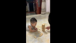 Play wooden tower game