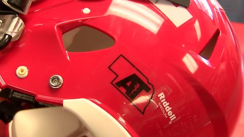 Helmet sticker gives athletic trainers the spotlight