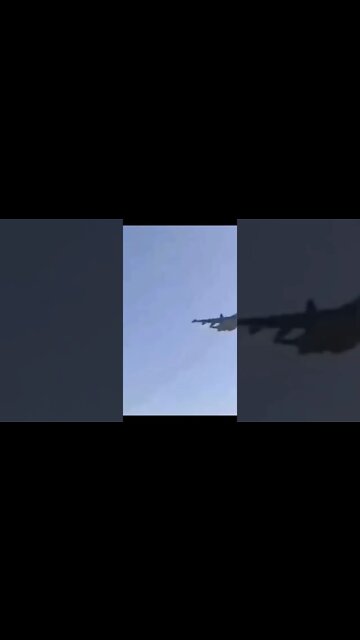 Russian SU-25 showing love to the troops and doing a fly by