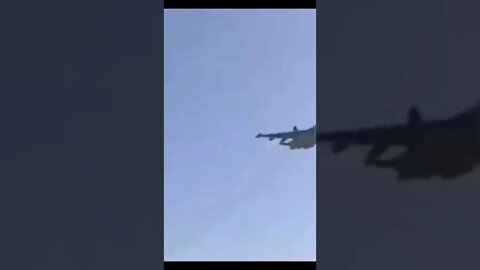 Russian SU-25 showing love to the troops and doing a fly by