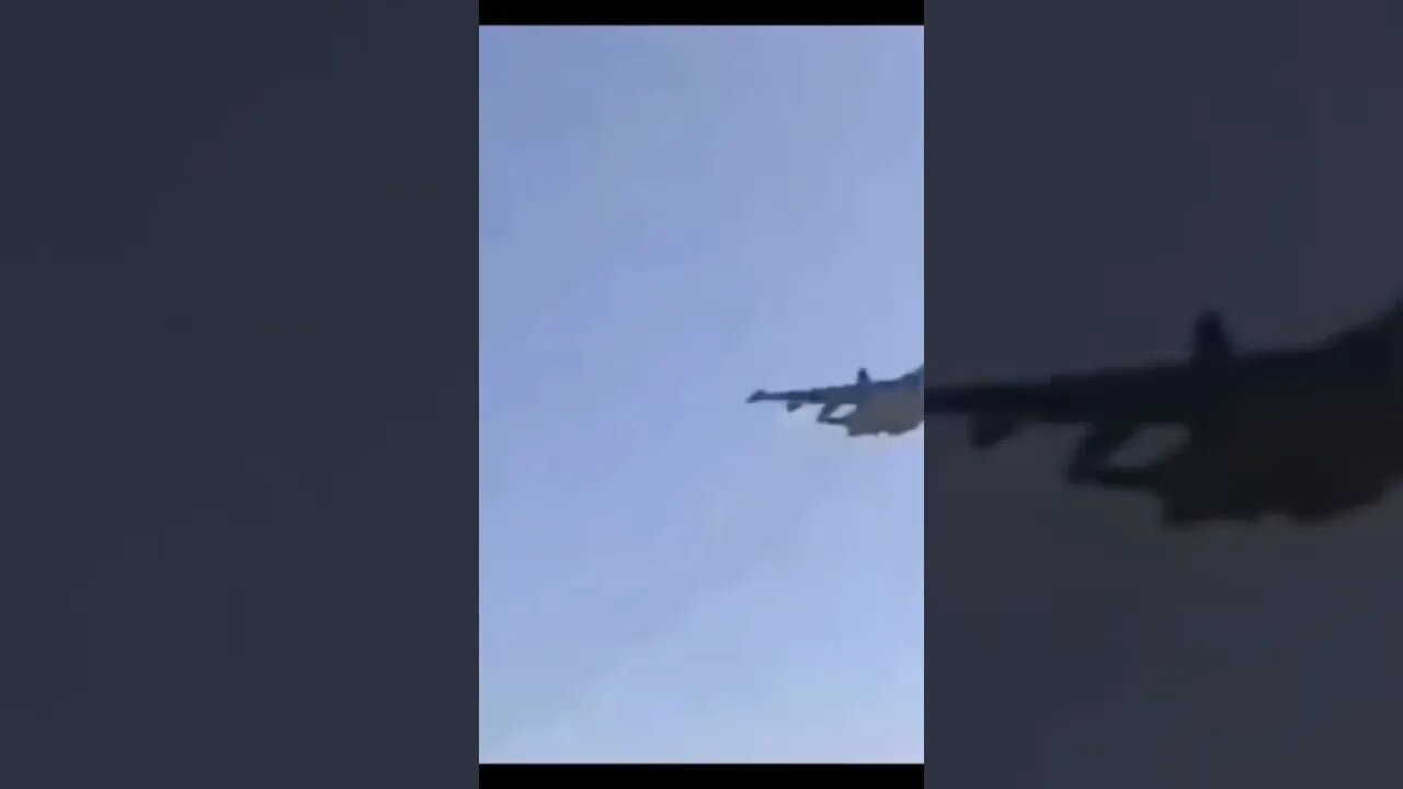 Russian SU-25 showing love to the troops and doing a fly by