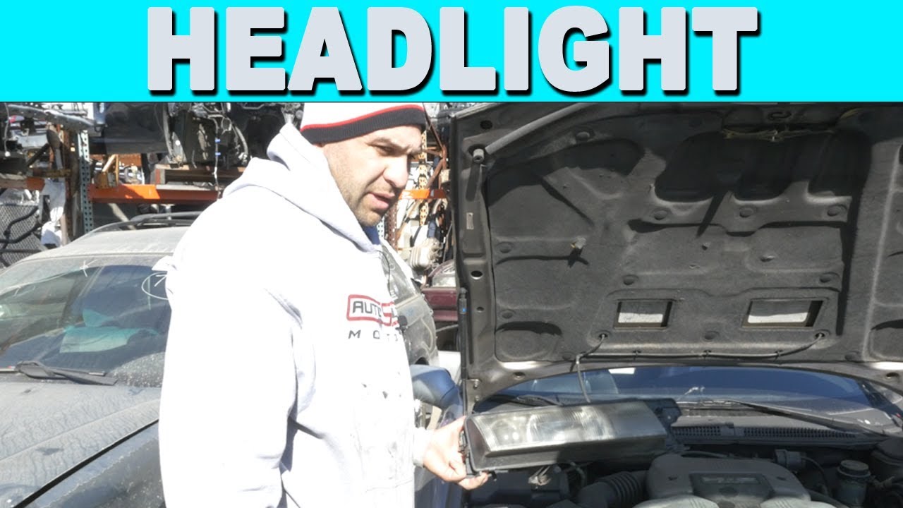 How to Remove a Headlight Headlamp Assembly - 1992 Subaru SVX