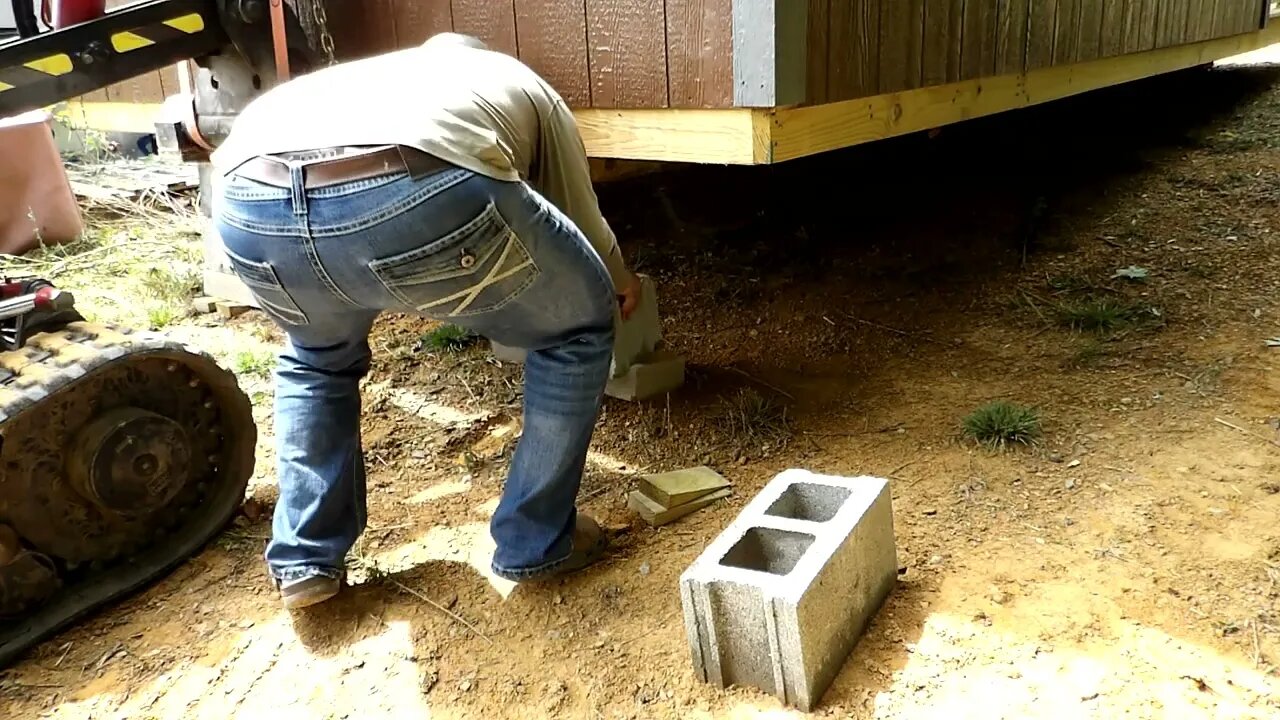 Getting the new building blocked up and level.