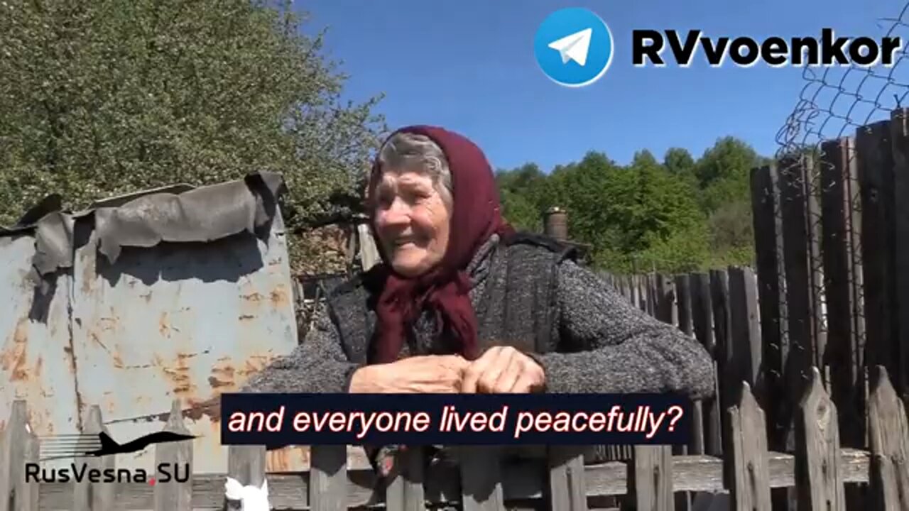 Russian soldiers brought a food package to a elder resident of a liberated settlement in the LPR