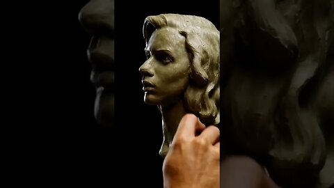 Finishing up the sculpture. Portrait sculpting.