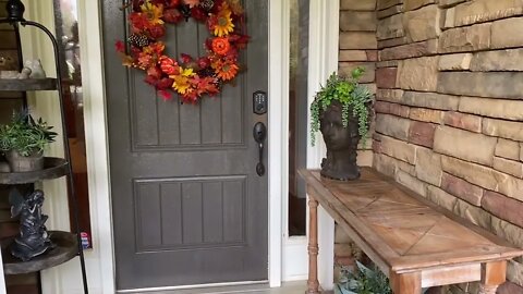 Decorating the front porch for autumn season