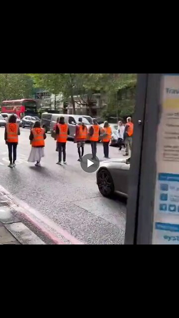 Climate activists block the wrong driver in London, England.