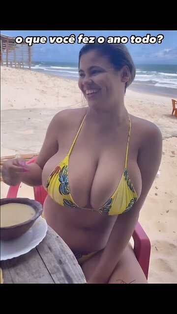 Big breast bikini on the beach