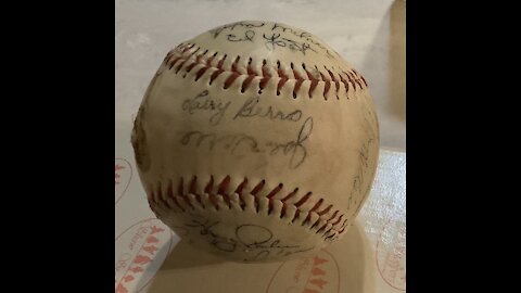 What is this signed baseball worth? Yogi Berra,Willie Mays and others