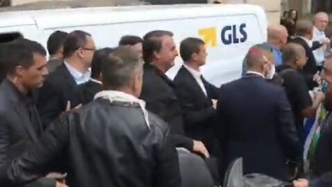 President of Brasil Bolsonaro getting a warm welcome in Rome.