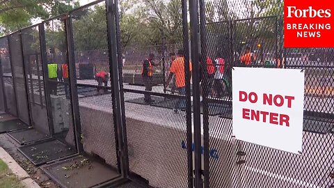 Chicago Crews Install Additional Security Fencing Outside The Arena Where The DNC Is Being Held