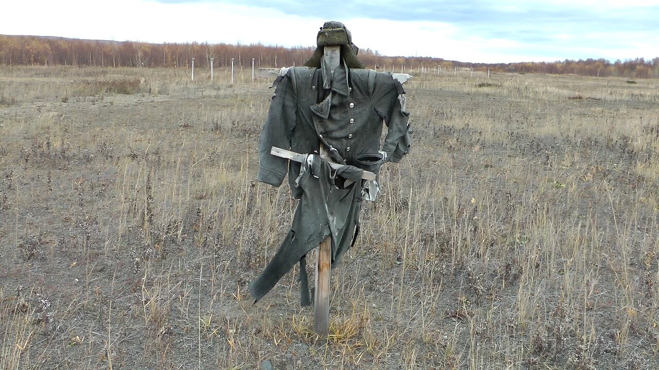 An effigy on the runway, dressed in a Soviet military uniform, reminds of the Cold War. Free footage