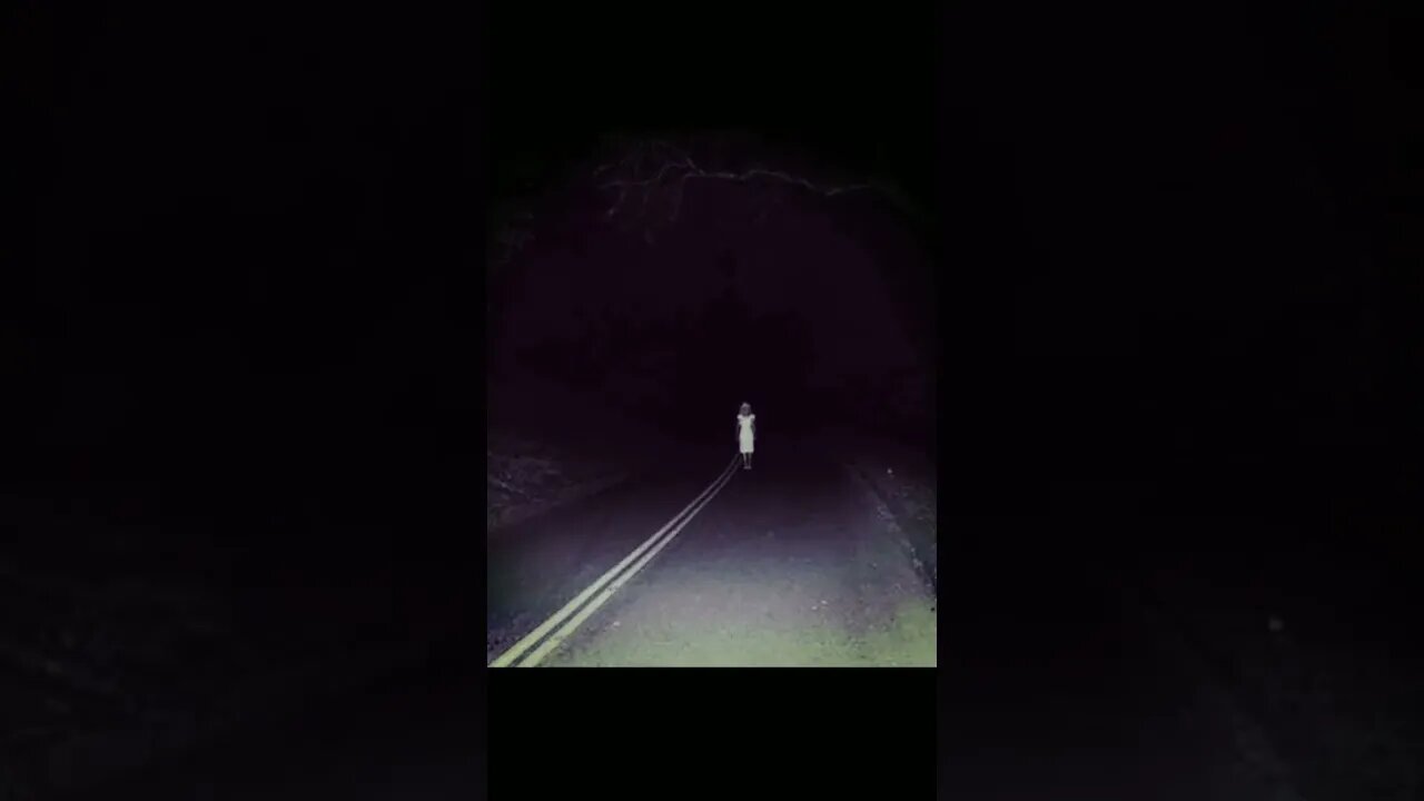 Creepy girl on Scary Road