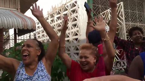 Video captures neighborhood's joy as We Energies crews restore power in Puerto Rico