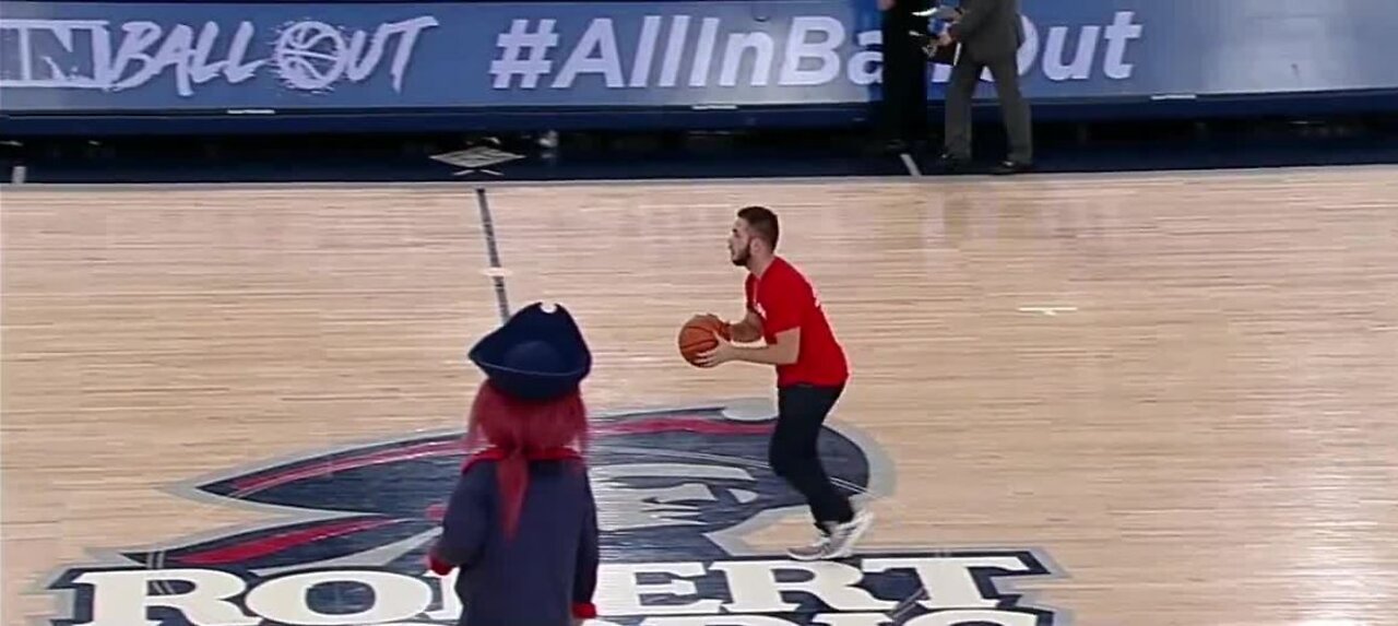 Fan hits half-court shot, wins free chicken for a year