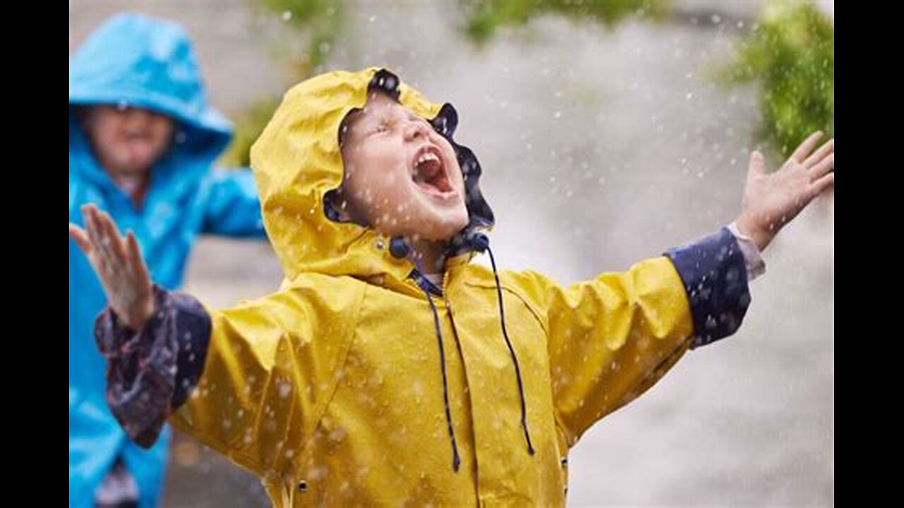 Children playing with a dancing fountain