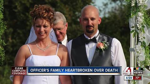 Family of fallen officer speaks out as manhunt for suspect continues