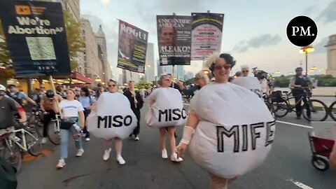 Protestors in Chicago Dressed as Abortion Pills Near the DNC