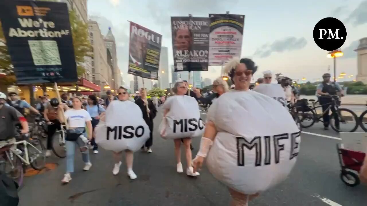 Protestors in Chicago Dressed as Abortion Pills Near the DNC