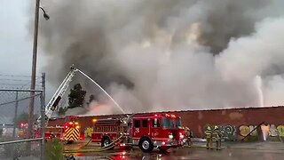 Building burning in Commerce manufactures plastic benches according to LACOFD crews...