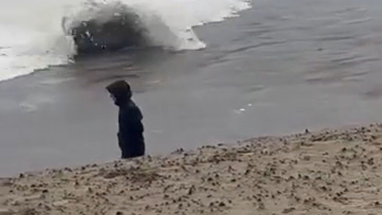 Woman On Beach Comes Within An Inch Of Death As A Massive Wave Nearly Became Her Final Destination