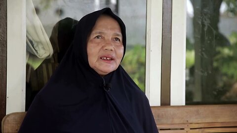 Indonesian tsunami survivor waits for son to return, two decades on | REUTERS