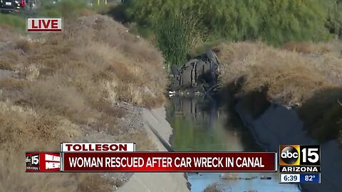 Woman hurt in crash into canal