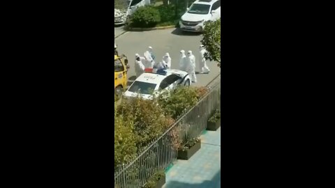 Chinese police dressed as medical staff beat civilians