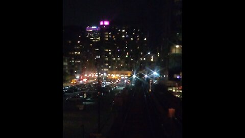 Beautiful Downtown Chicago from a birds eye view from the Best seat in the CTA Train at night time