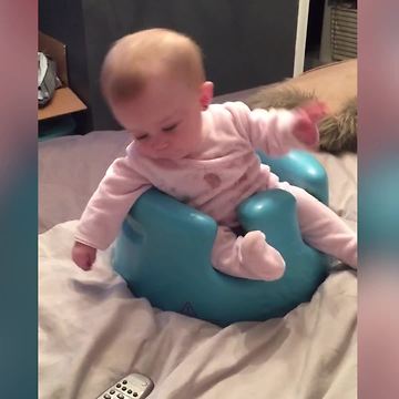 "Baby Girl Falls Out of Her Booster Chair When She Leans To Get TV Remote"