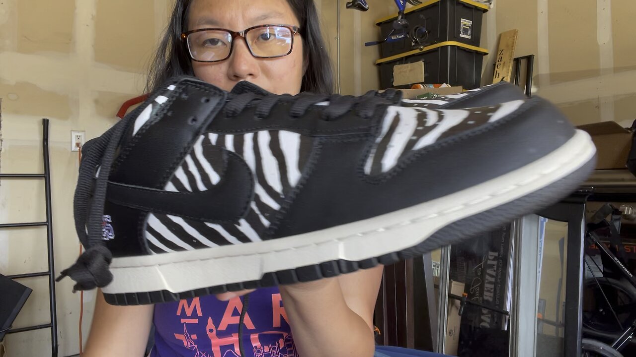 This is a pair FAKE Nike dunk zebra shoes