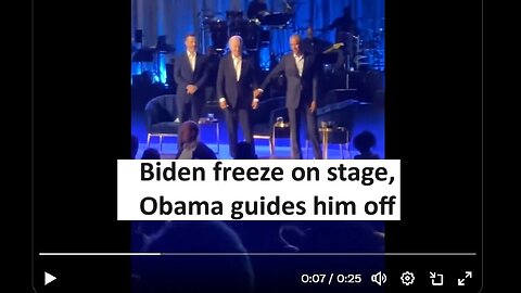 Biden freeze on stage, Obama guides off