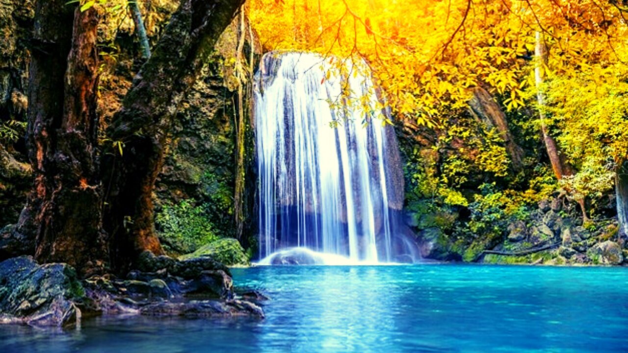 Incredible waterfall with blue waters amidst nature in a calm and peaceful environment.