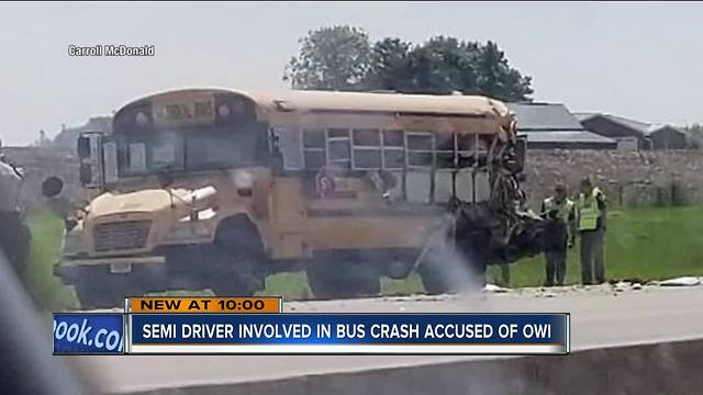 Truck driver arrested for OWI after crash with school bus