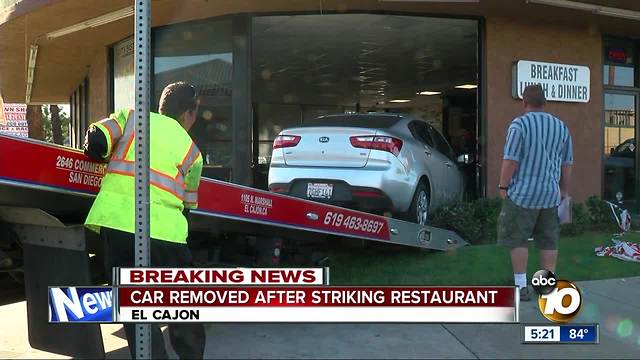 Car removed after striking restaurant in El Cajon