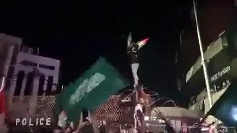 Hamas flag raised on the fence of the American embassy in Beirut.