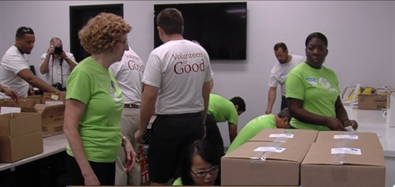 Volunteers pack hurricane food kits for seniors